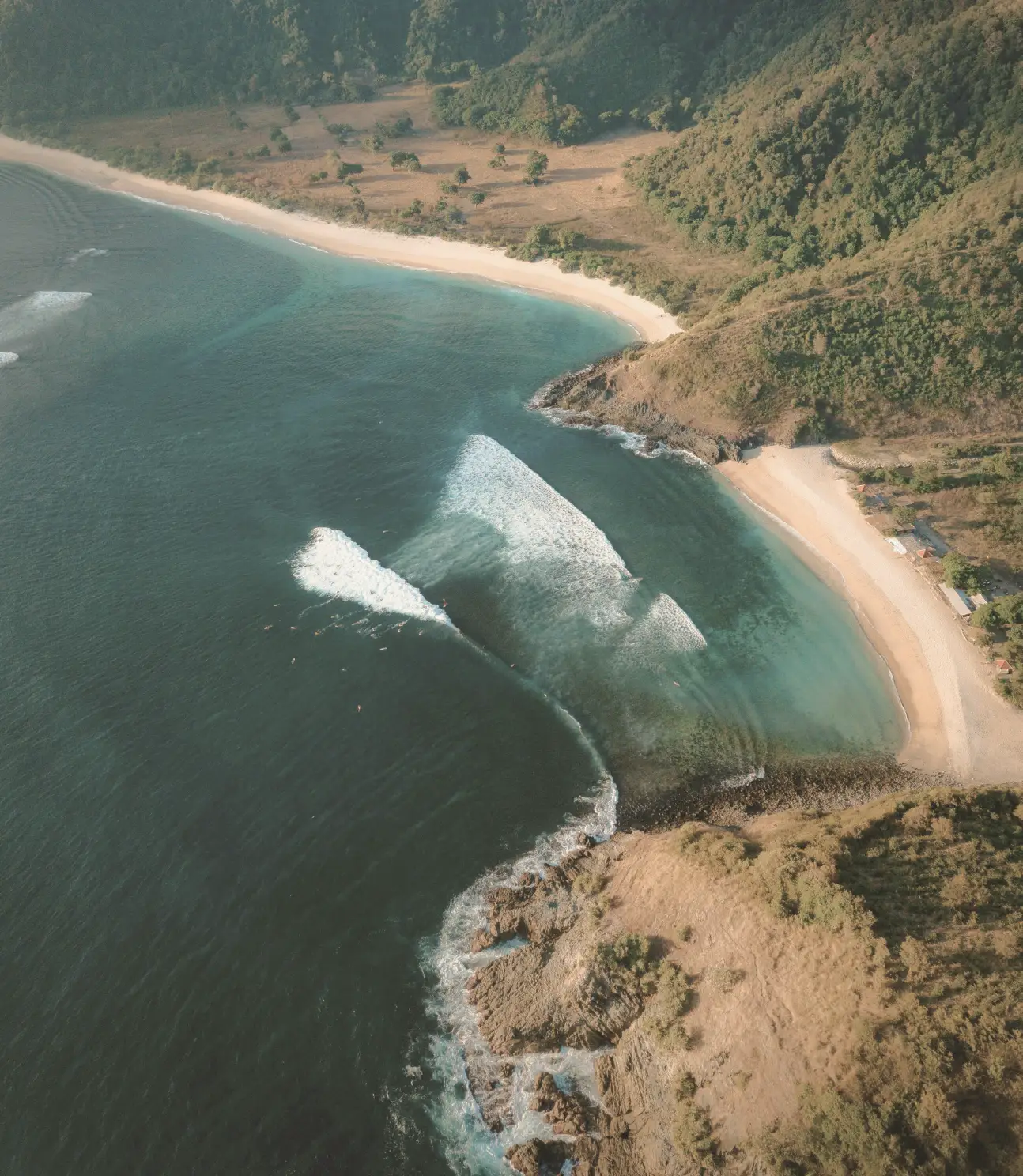 Aerial view of the South Lombok coastline near Kuta — turquoise bays and white sand