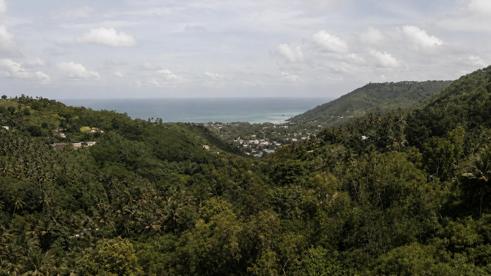 Panoramic ocean and jungle hills view from the Konekt Plots land, Kuta South Lombok