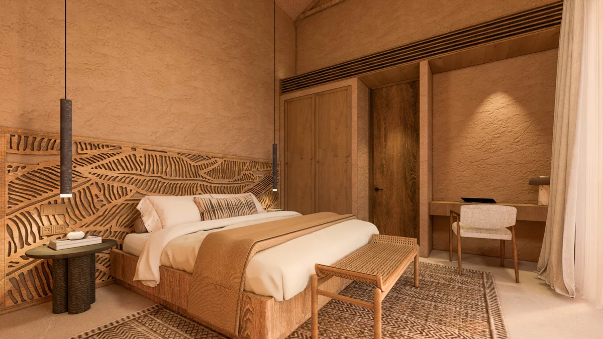 Konekt 3 Bedroom Villa bedroom with carved timber headboard, Lombok